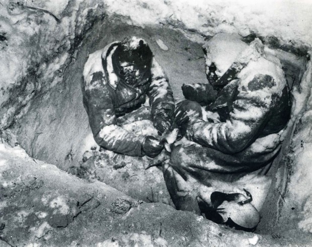 Two-Soviet-infantrymen-who-froze-to-death-in-their-fox-hole,-Finland,-1940